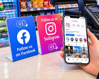 May include: Two L-shaped acrylic signs with social media branding. The blue sign features the Facebook logo and text Follow us on Facebook. The pink and orange gradient sign features the Instagram logo and text Follow us on Instagram.