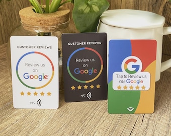 May include: Three rectangular cards with Google branding. The cards feature the text "Customer Reviews" and "Review us on Google." One card is white, one is black, and one is multi-colored. Each card has a star rating and NFC symbol.