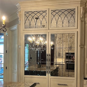 May include: A set of three ceramic mugs with a speckled, matte finish. The mugs are in shades of cream, light gray, and dark gray. Each mug has a simple, minimalist design, perfect for coffee or tea.