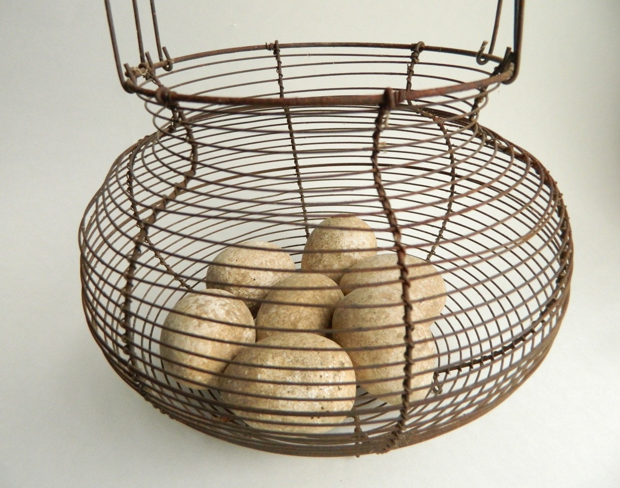 Antique Wire Egg Basket with 7 Chalkware Eggs