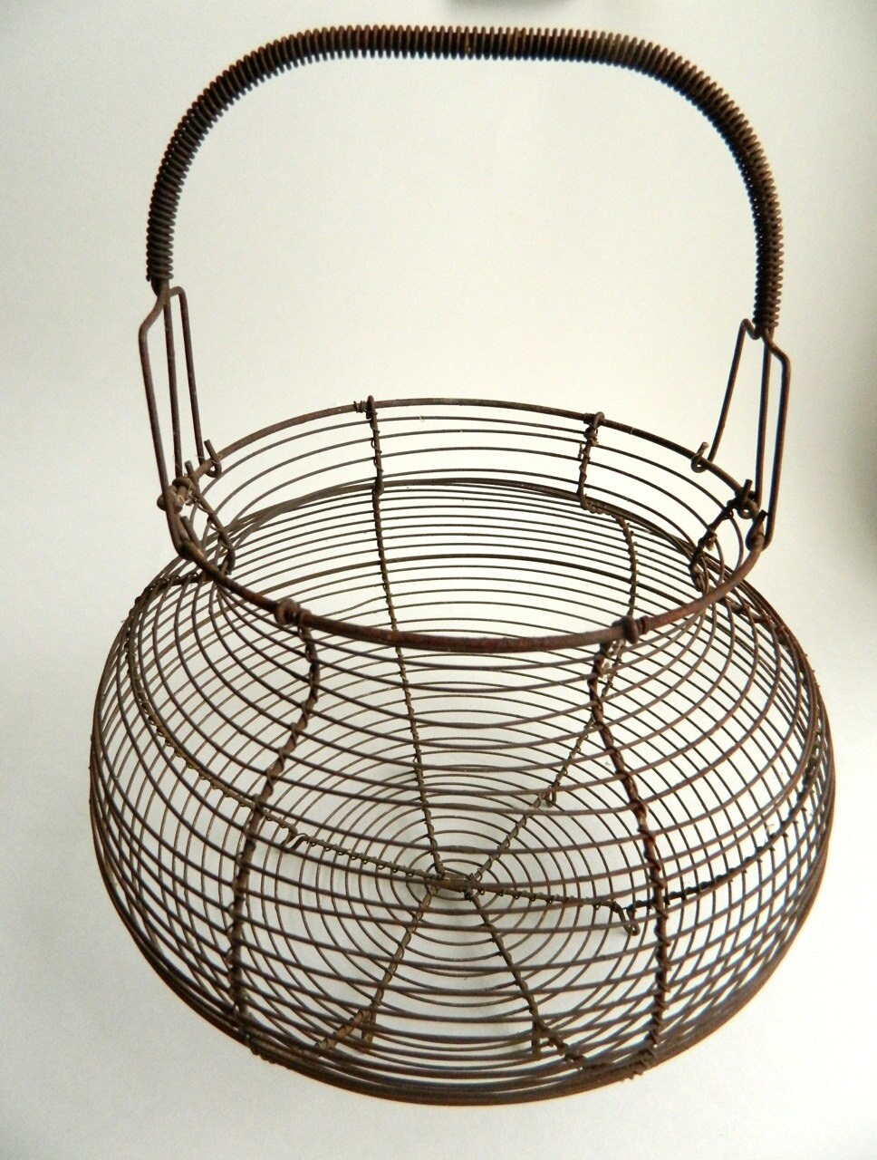 Antique Wire Egg Basket with 7 Chalkware Eggs