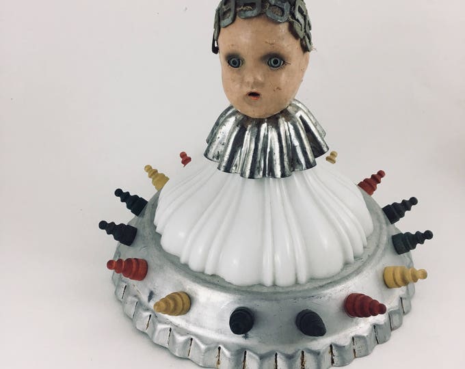Well-Seated Vintage Doll Assemblage