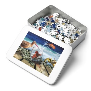 Fun Colorful Beach Scene Jigsaw Puzzle called &quot;The Last Beach Toast&quot;. Available in 30, 110, 252, 500,1000-Piece Sizes in a quality metal box