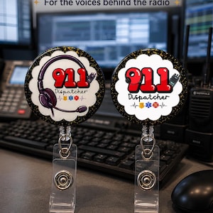 May include: Two circular badge reels with black glitter borders. The left reel features a purple headset graphic, the text 911 Dispatcher, and small emergency icons. The right reel displays the text 911 Dispatcher with a police badge and medical star.