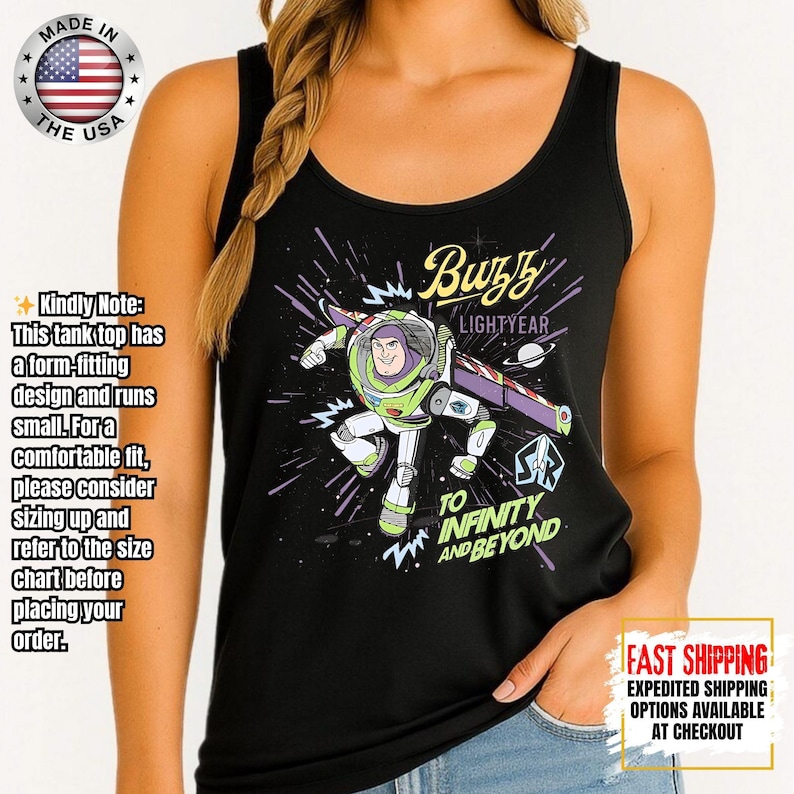 May include: Black tank top with a Buzz Lightyear graphic, the text "Buzz Lightyear" and "To Infinity and Beyond." The design has a space theme with purple and white accents. Made in the USA.
