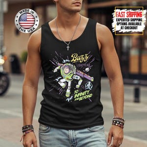 May include: Black vest top with a Buzz Lightyear graphic from Toy Story. The design includes the text "Buzz Lightyear" and "To Infinity and Beyond" with a space-themed background. The vest top also has a "Made in the USA" logo.