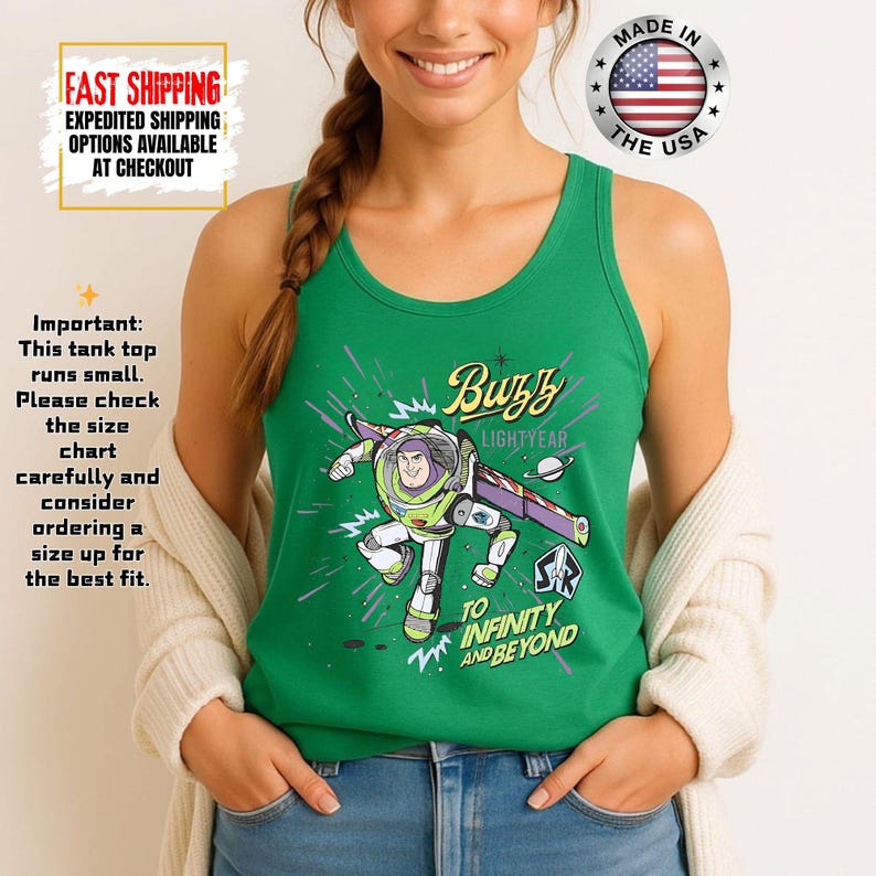 May include: A green tank top with a graphic of Buzz Lightyear, the text "Buzz Lightyear" and "To Infinity and Beyond." The tank top is made in the USA. The text "Important: This tank top runs small" is also visible. The tank top has a racerback design.