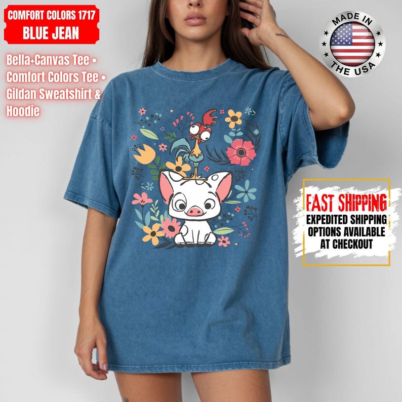 May include: Blue jean Comfort Colors 1717 t-shirt with a graphic of a pig, rooster, and flowers. The shirt has the text "Made in the USA" and "Fast Shipping" on it. The shirt is a Bella+Canvas Tee, Comfort Colors Tee, and Gildan Sweatshirt & Hoodie.