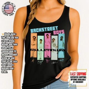 May include: Black tank top featuring the text "BACKSTREET BOYS" in a colorful font. Below the text are images of the band members with the word "Millennium" and their signatures. The tank top is made in the USA.
