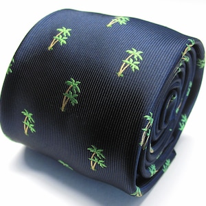 May include: A dark blue silk tie with a repeating pattern of green palm trees.