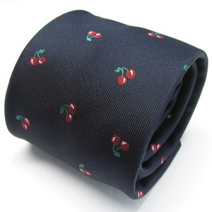 May include: A dark blue silk tie with a repeating pattern of red cherries. The cherries have green stems and leaves.