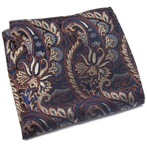 May include: A dark blue paisley pocket square with a gold and orange floral pattern.