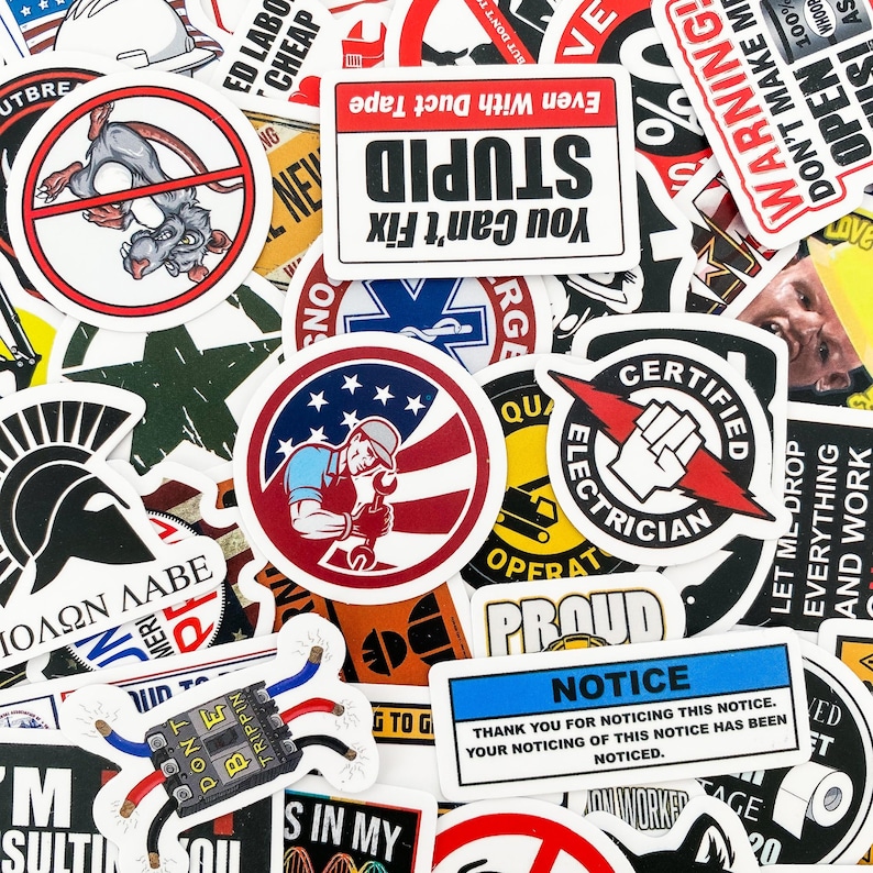 May include: A collection of colorful stickers with various designs and phrases. Some of the stickers feature humorous sayings like "You Can't Fix Stupid" and "Don't Make Me Open 100% of My Ass!"  Others feature images of a rat, a spartan helmet, and a cartoon electrician.