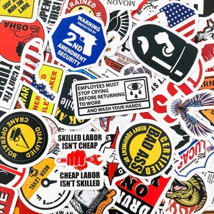 May include: A collection of colorful stickers with various designs and slogans. Some of the stickers feature humorous sayings, such as "Skilled Labor Isn't Cheap" and "Bad Ass Certified". Other stickers feature patriotic themes, including a sticker with the words "2nd Amendment Security".