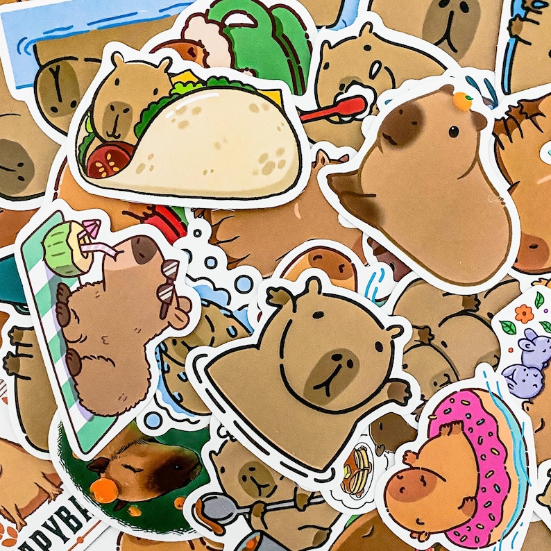 May include: A collection of colorful stickers featuring cartoon capybaras in various activities, including eating tacos, swimming, and relaxing. The stickers are perfect for adding a touch of whimsy to laptops, water bottles, or journals.