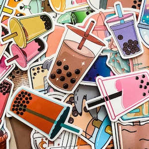 May include: A collection of colorful bubble tea stickers featuring various designs, including brown, pink, and purple cups with boba pearls, straws, and other cute details.