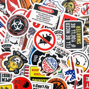 May include: A collection of colorful stickers with various designs and text. Some of the stickers feature American flags, skulls, and warning signs. The text on the stickers includes phrases like "Zombie Outbreak", "I'll Be Nicer If You'll Be Smarter", and "Union American Made Pride".