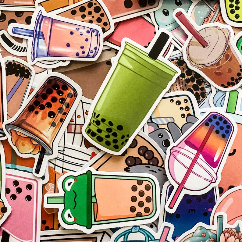 May include: A collection of colorful stickers featuring various bubble tea designs. The stickers feature different colors, patterns, and designs, including green, pink, orange, and blue. Some stickers feature cartoon characters, while others feature simple designs of bubble tea cups.
