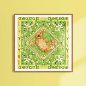May include: A framed illustration of a dog with a green, yellow, and orange floral pattern. The dog is lying on its back with its paws in the air. The text "Lemon" is written in the center of the illustration.