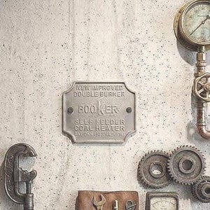 Vintage Booker "Self Feeder" Coal Heater Cast Iron Plaque