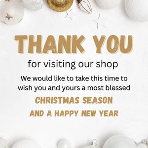 May include: A seasonal greeting card with gold text saying "THANK YOU" and wishing a "CHRISTMAS SEASON" and "A HAPPY NEW YEAR". The image is decorated with white and gold Christmas baubles and star-shaped ornaments.