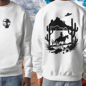 Cosmic Cowboy Sweatshirt: Humorous UFO Desert Graphic