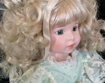 Vintage Handmade Porcelain Doll, Blond Hair, Green Dress. Used.