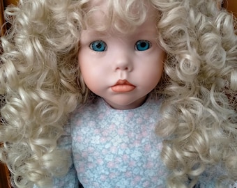 Vintage  collection doll Hillary 1987. Diana Effner. The doll's body is completely porcelain . Used.