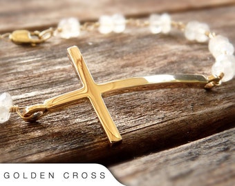 14 karat yellow gold cross bracelet on rainbow moonstone