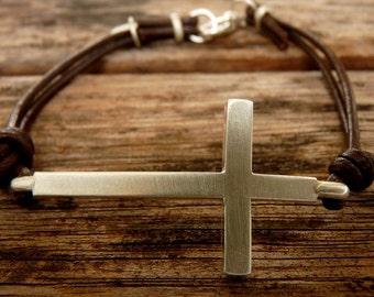 Silver cross with leather and lobster clasp