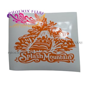 May include: Orange vinyl sticker featuring the Splash Mountain ride. The design shows a log flume boat descending a waterfall, with the words "Splash Mountain" in a stylized font. The sticker has a white background.