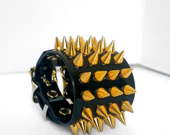 Black & Gold 4 Row Spiked Vinyl Cuff