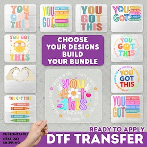 May include: A collection of square DTF transfer sheets featuring various colourful designs with the text "YOU GOT THIS" and motivational phrases like "DON'T STRESS" and "ROCK THE TEST." The graphics include smiley faces, crayons, and hands forming a heart.