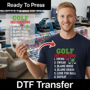 May include: A navy blue t-shirt featuring a graphic print with the text GOLF INSTRUCTIONS, 1. SWING, 2. SWEAR, 3. BLAME NOISE, 4. BLAME GRASS, 5. LOOK FOR BALL, 6. REPEAT, accompanied by a red flag and a green golf ball icon with crossed clubs.