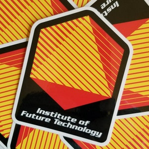 May include: A black and white sticker with a red and yellow geometric design. The sticker says "Institute of Future Technology".