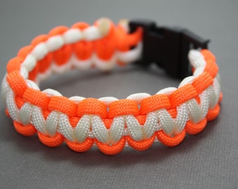 Paracord Bracelet -Orange & White with Side Release Buckle- Cobra-Fishtail-Criss Cross-Baseball-Cat Claw-Shark Jaw Bone-Dotted Blaze-Duality