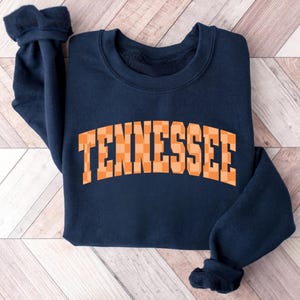 a sweatshirt with the word tennessee on it