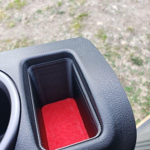 370z center console button delete