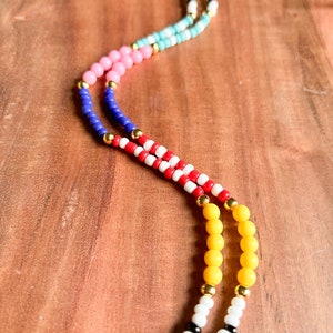 Classic teacher colors and customizable lanyard. This lanyard is between 18-19 inches in length with a breakaway clasp.