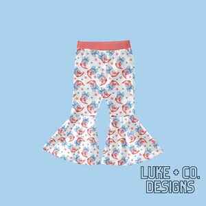 May include: White bell-bottom trousers with a red waistband and a pattern of blue and red shoes with bows. The trousers are made of a soft, comfortable fabric and are perfect for everyday wear.