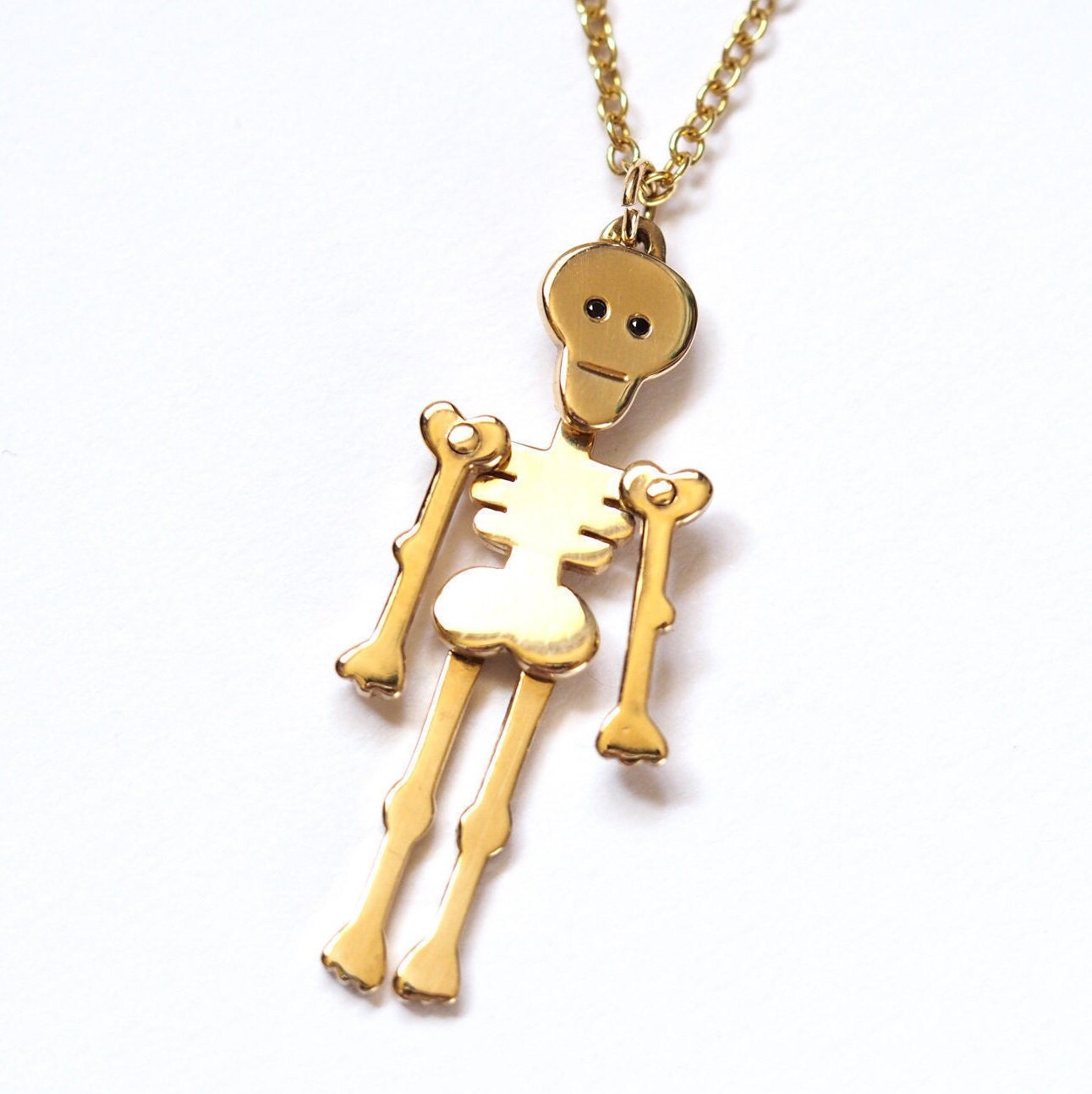 Gold on sale skeleton necklace