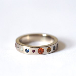Planet Ring: Recycled Sterling Silver, Sapphire, Diamond, Ruby Eternity Band