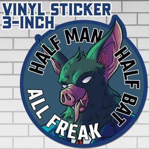 May include: A 3-inch vinyl sticker featuring a cartoon illustration of a bat-pig hybrid with the text "HALF MAN HALF BAT ALL FREAK". The design is set within a blue circle with white text and a dark blue background.