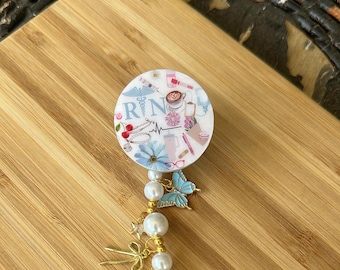 Registered Nurse Collage Badge Reel, Alligator Swivel Clip, Charms