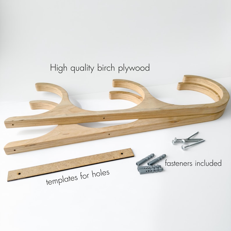 May include: A set of two wooden coat racks made of birch plywood. The racks are designed to hold coats, hats, and other items. The set includes templates for holes and fasteners.