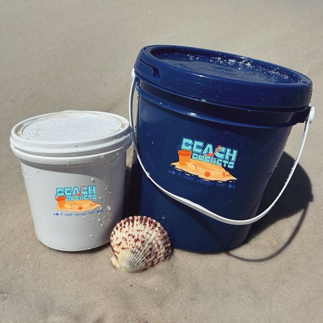 Beach Bucket- A Coastal Scavenger Hunt. Search through the sand to find unique shells.