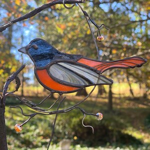 Stained glass oriole bird