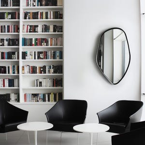Asymmetrical wall mirror. Model F