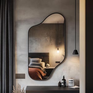 Asymmetrical wall mirror. Model a31