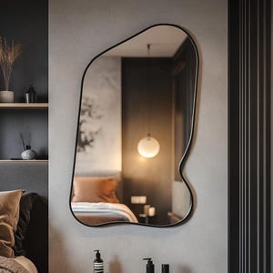 Asymmetrical wall mirror. Model Z